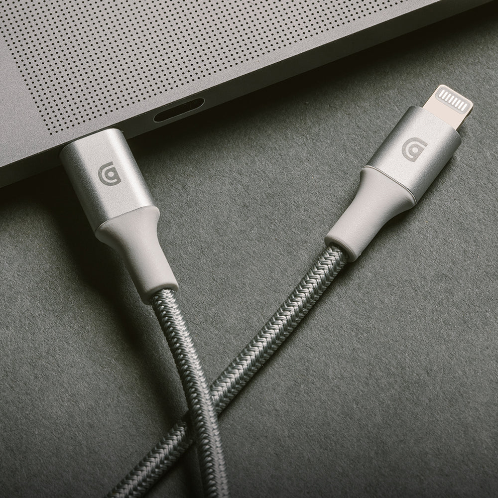 Griffin Lightning Cable plugged into a macbook laptop 